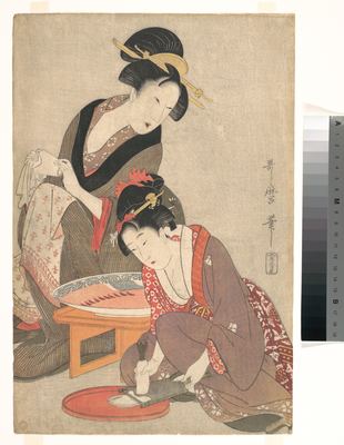 Women grating radish