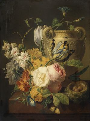 Flowers by a stone vase