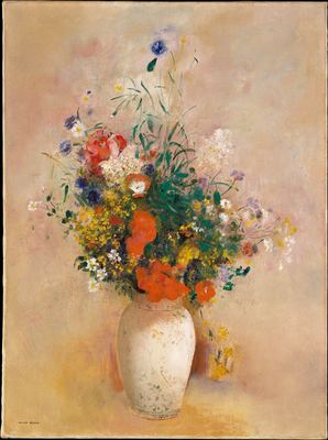 Vase of flowers on pink