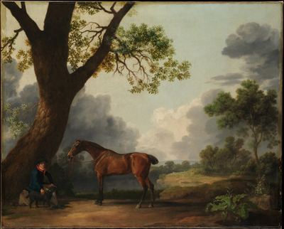 A hunter, a groom and a dog