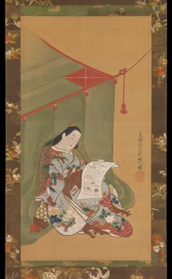 A woman reading under a mosquito net